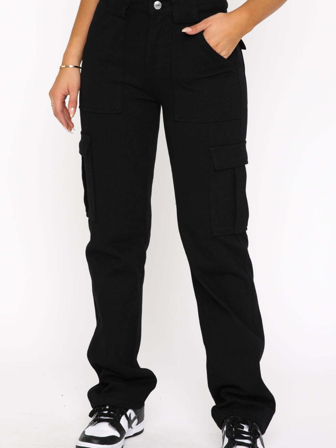 Black straight-leg cargo pants with flap cargo pockets and button waist