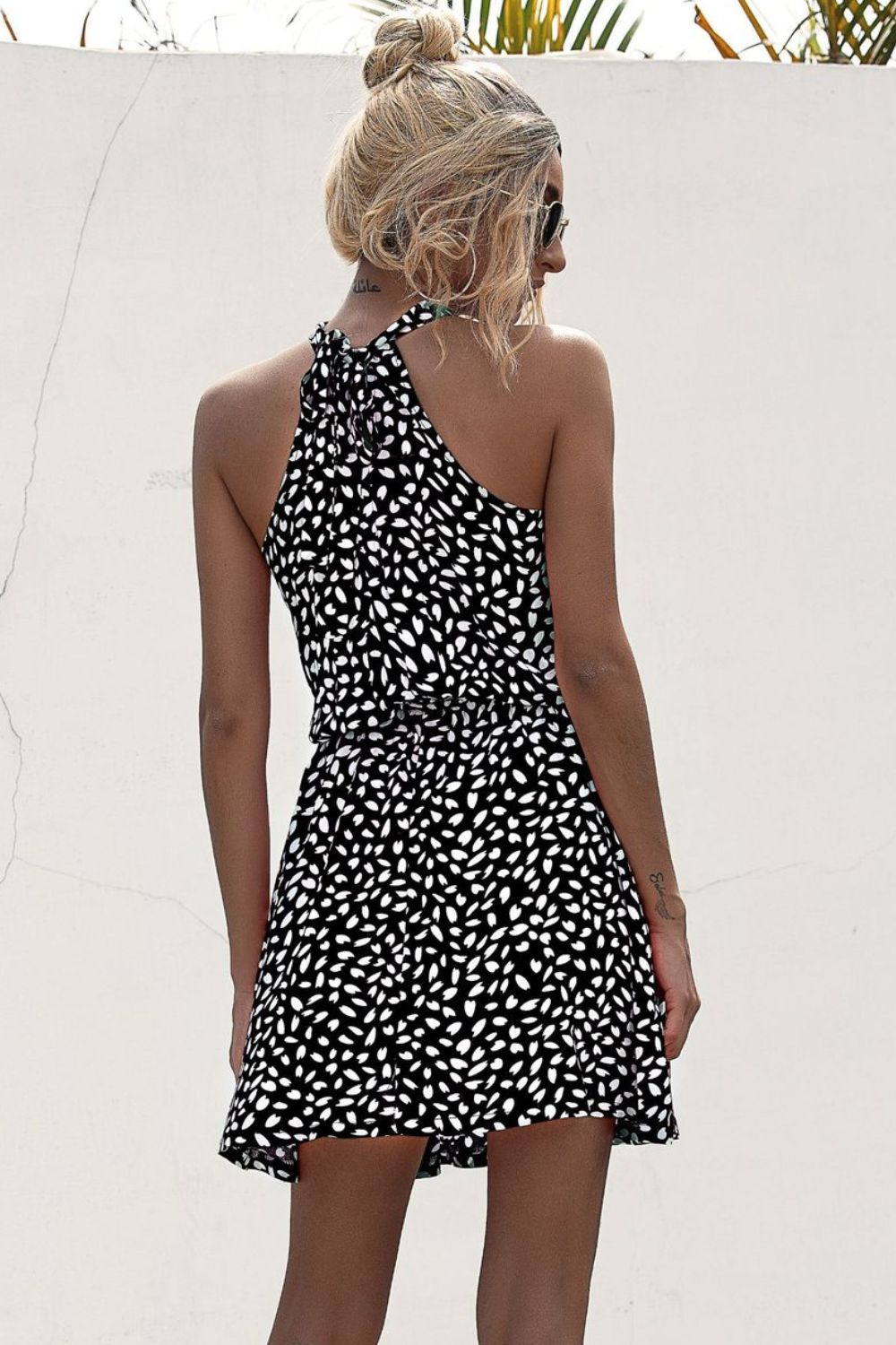 Backless halter mini dress, black with white abstract print, open back detail