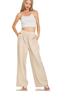 Sand beige wide-leg gauze pants with elastic waistband and side pockets