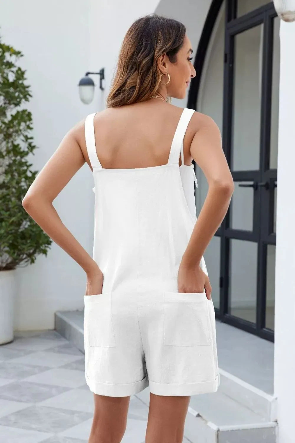 White knotted-strap romper with pockets, square back, short overalls