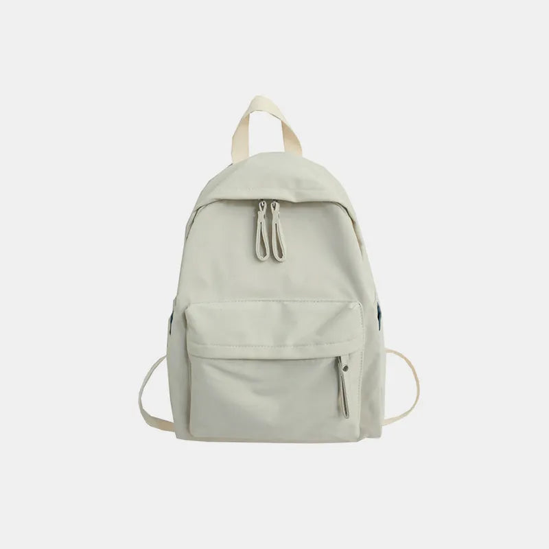 Ivory cotton zip backpack with top handle, front pocket, and drawstring zipper pulls