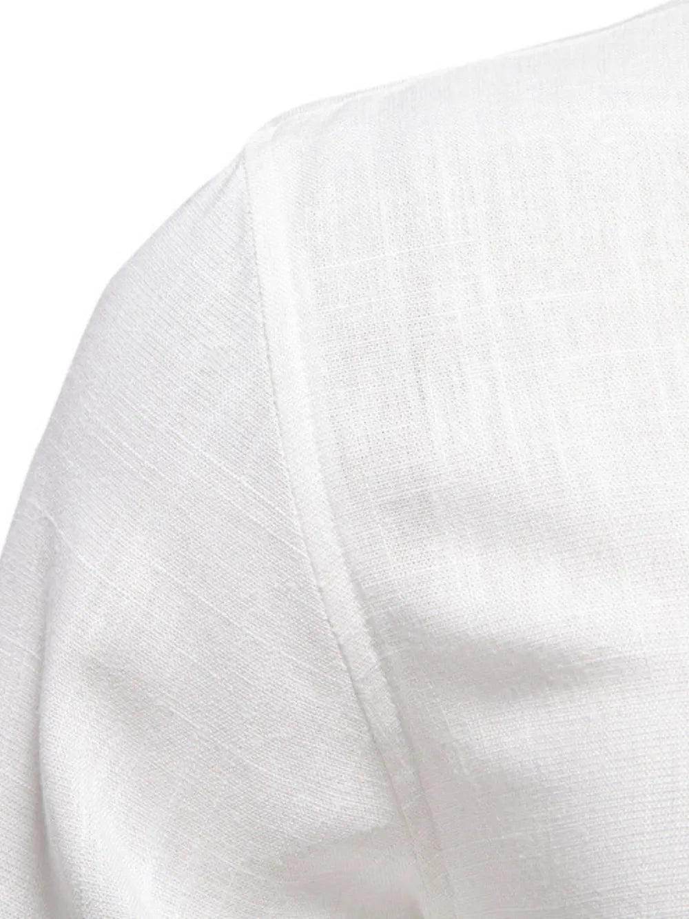 Men's button down shirt, white textured fabric close-up on shoulder seam