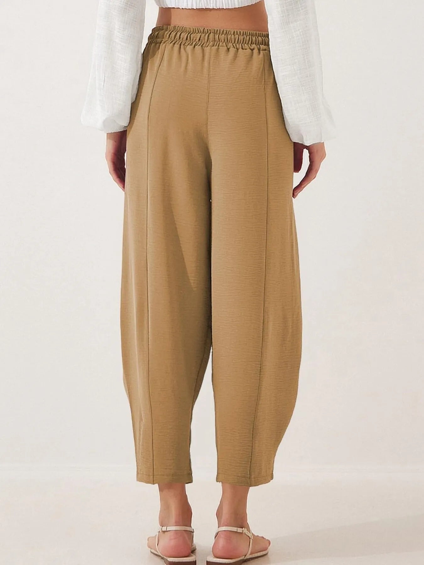 Cropped wide-leg pants in camel with elastic waist and drawstring