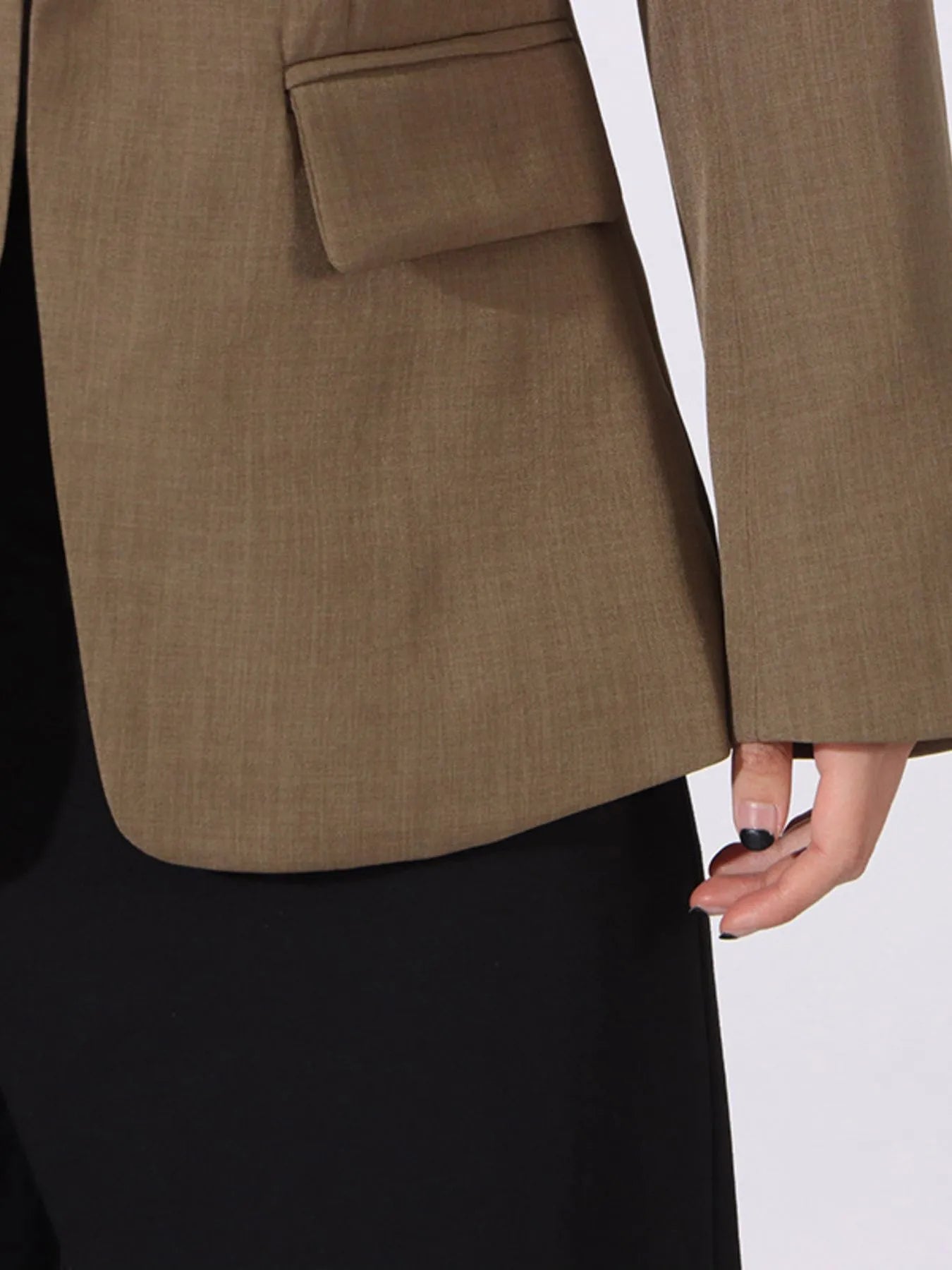 Khaki green blazer close-up of front flap pocket and hem with long sleeve cuff