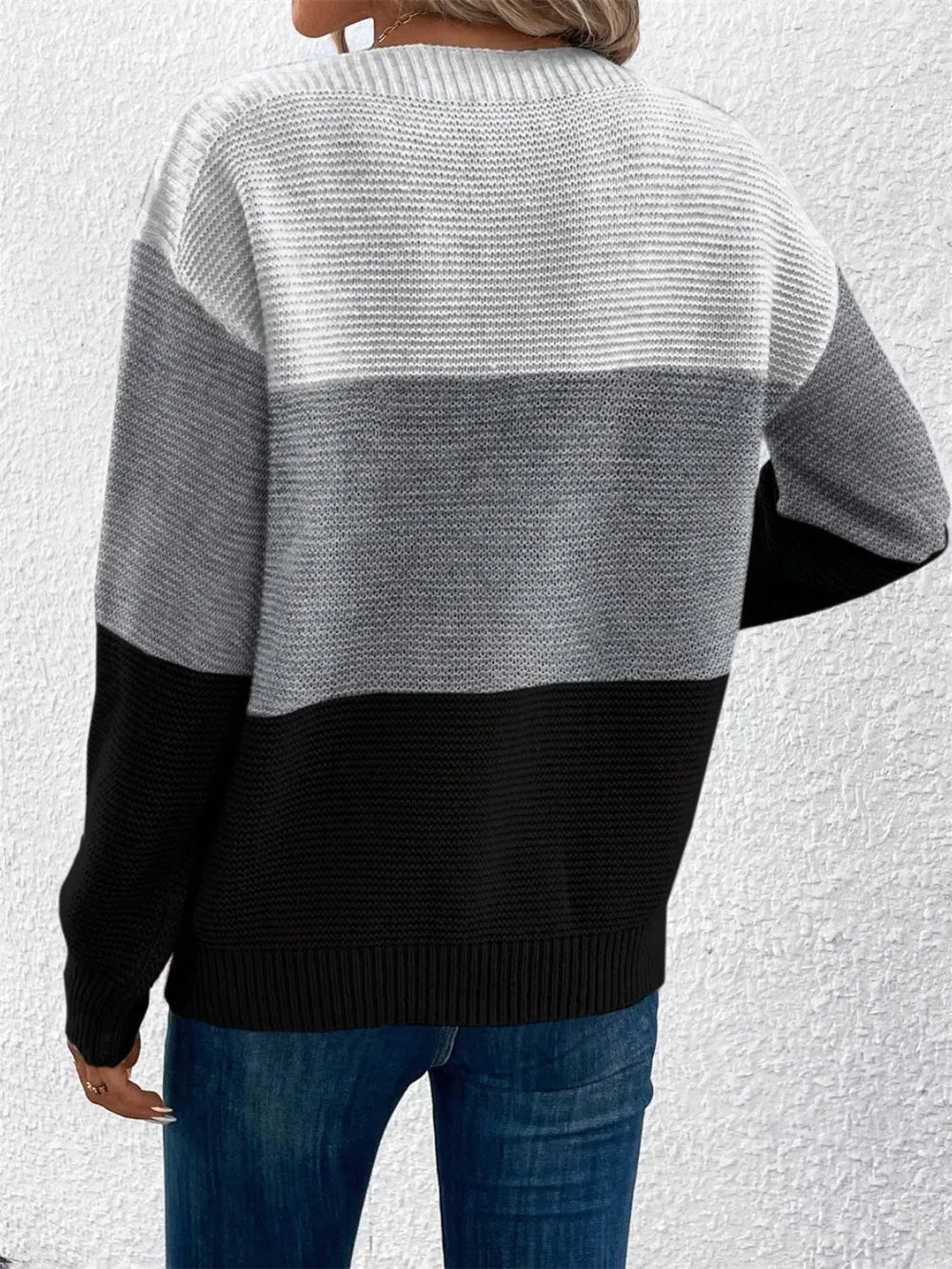 Women’s color block drop-shoulder sweater back in cream, gray, and black blocks