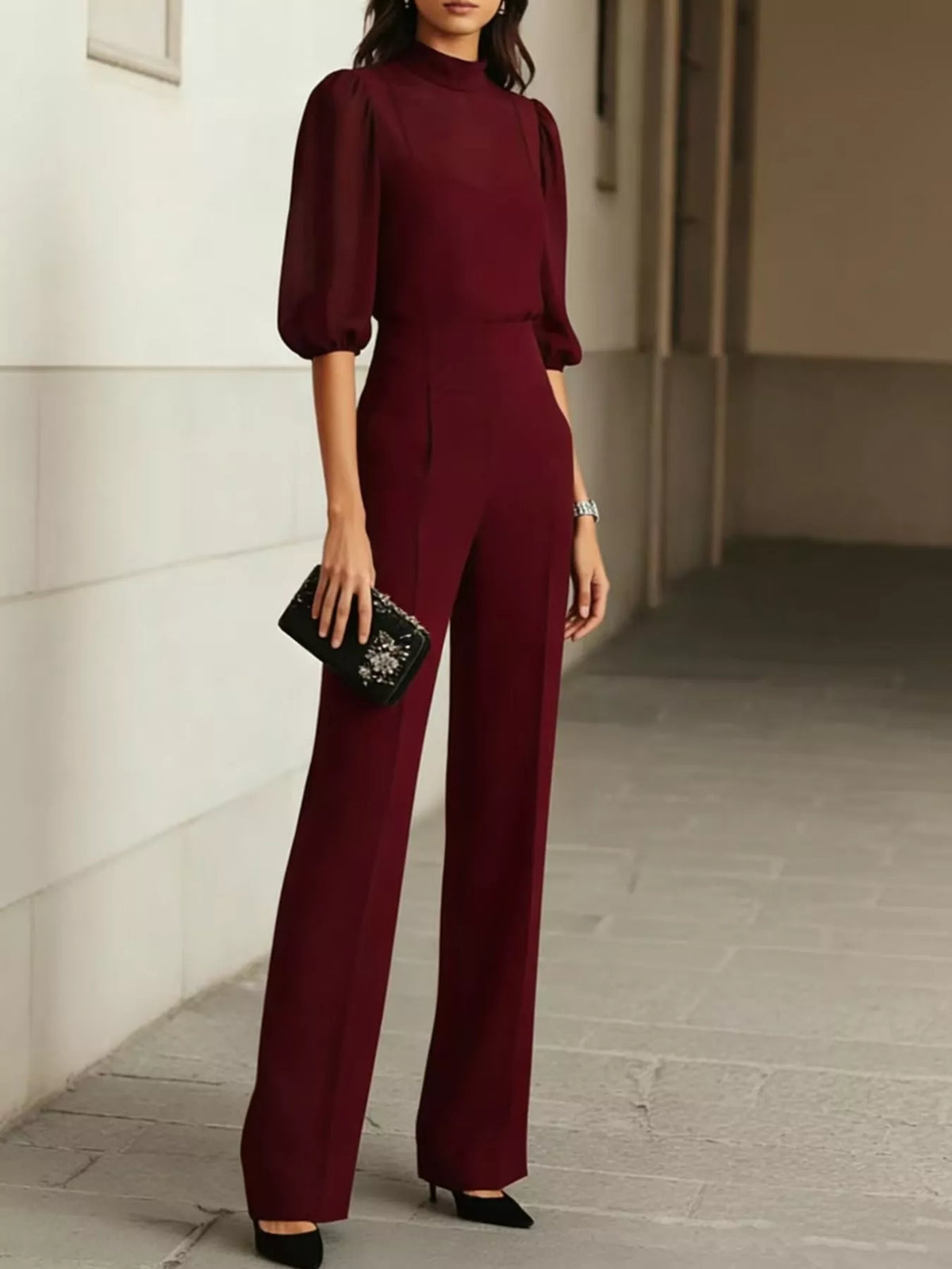 Burgundy mock neck sheer puff-sleeve top with wide-leg pants set, front three-quarter