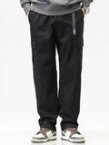 Men's cargo pants in black with elastic waist and side cargo flap pockets