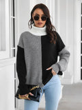 Color-block turtleneck sweater with long sleeves and ribbed cuffs, gray and black panels.