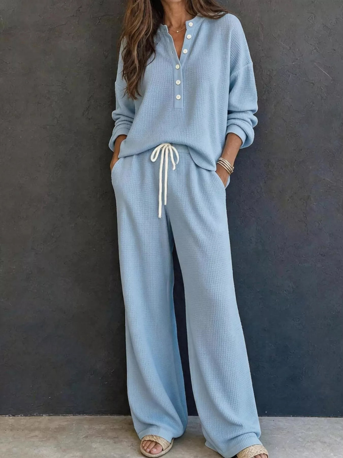 Blue waffle-knit lounge set: button henley pullover and drawstring wide-leg pants.