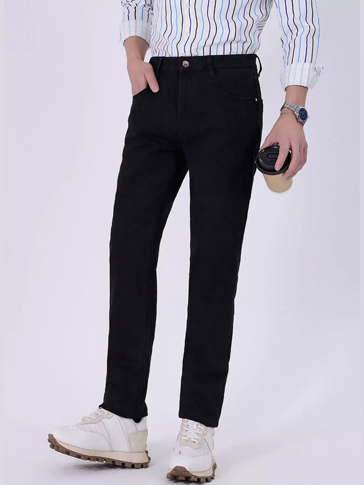 Black slim-fit jeans with belt loops, button closure, and front slash pockets