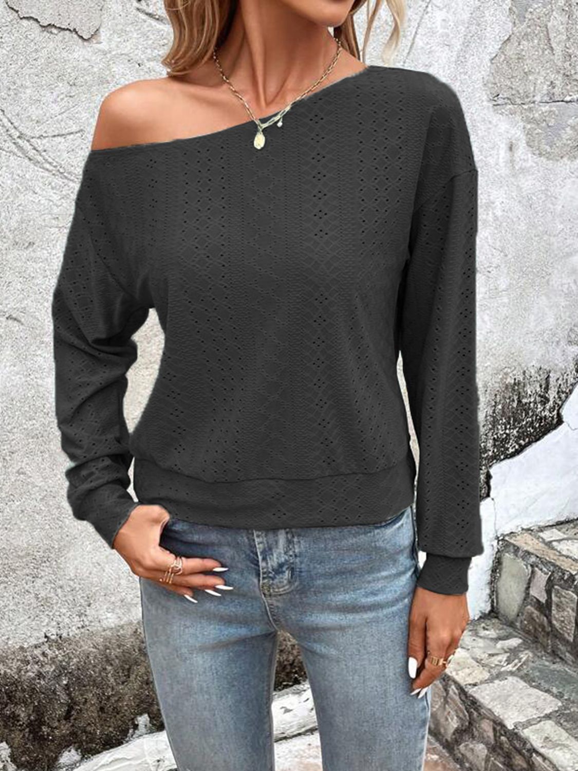 Black eyelet one-shoulder dropped-shoulder blouse with long sleeves