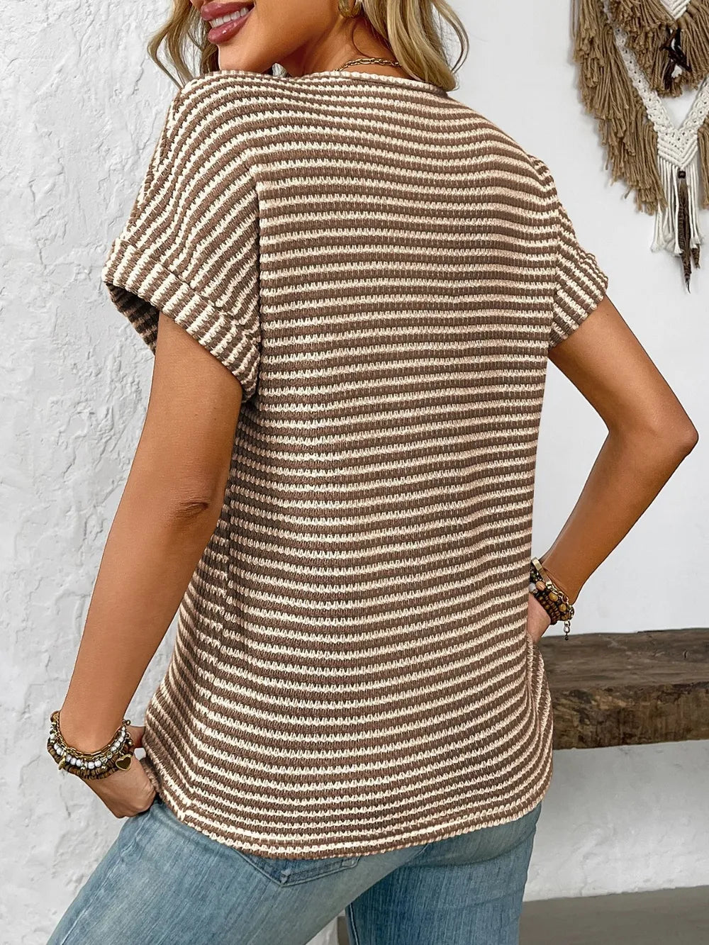 Striped short-sleeve T-shirt with V-neck, short hem, knit fabric in cream and dark stripes