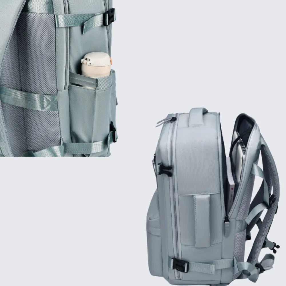 Light blue oxford backpack with side pockets, padded straps, and mesh back panel