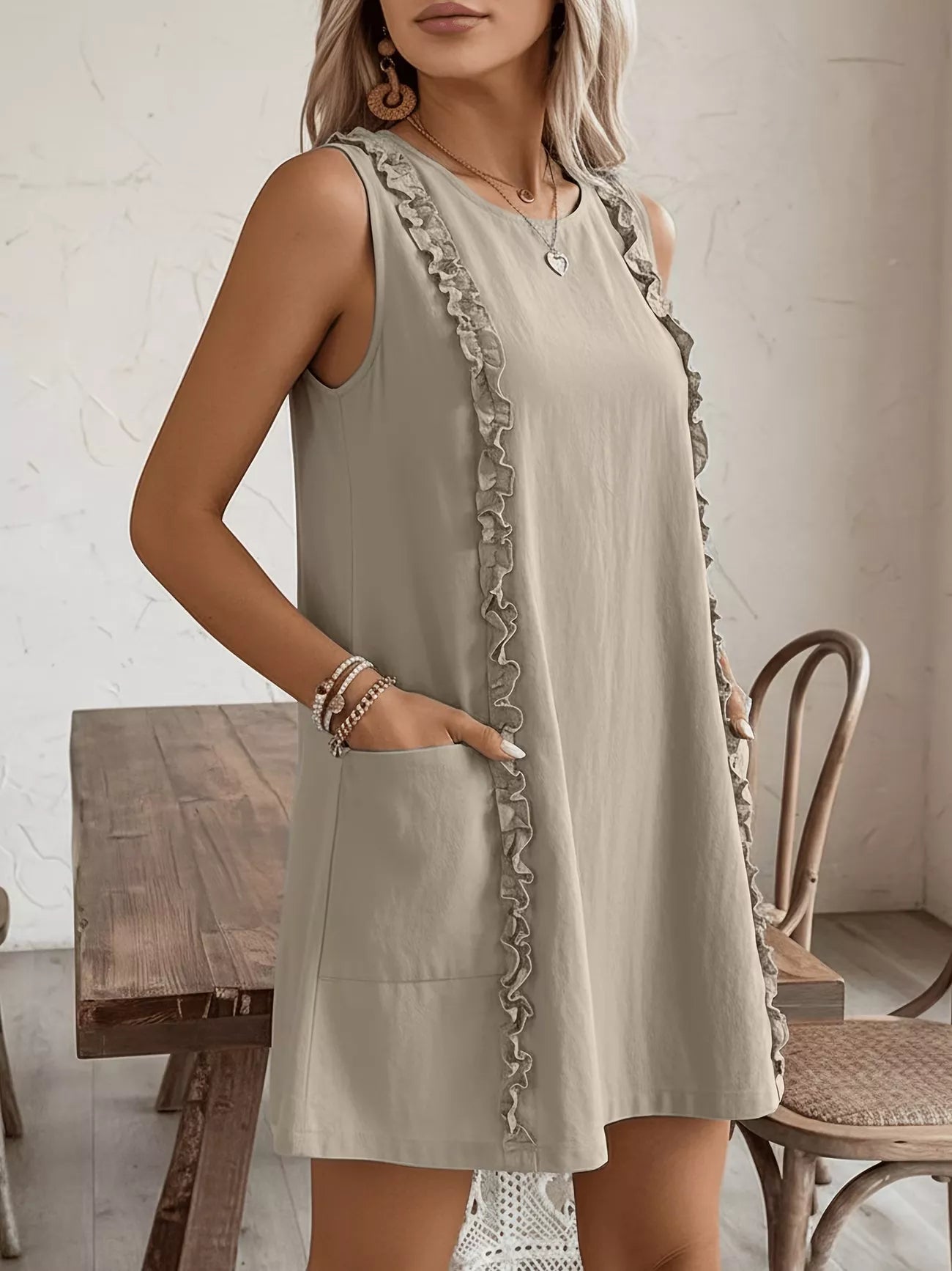 Cedar & Moore Frill Sleeveless Round-Neck Dress in taupe with pockets and ruffle trim by Trendsi