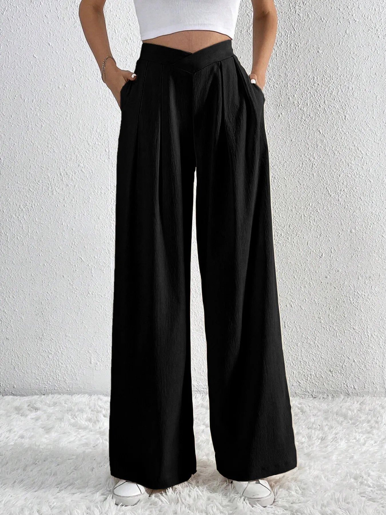 Black wide-leg pants with V-waist ruched front and relaxed high-rise fit