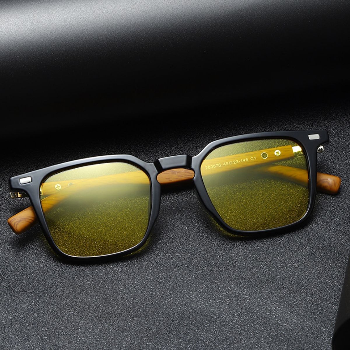 Cedar & Moore Square frame sunglasses with black frames, gold mirrored UV lenses, and wood temples.