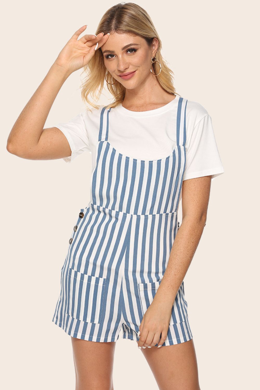 Striped scoop-neck romper with blue-and-white vertical stripes, bib front and shorts