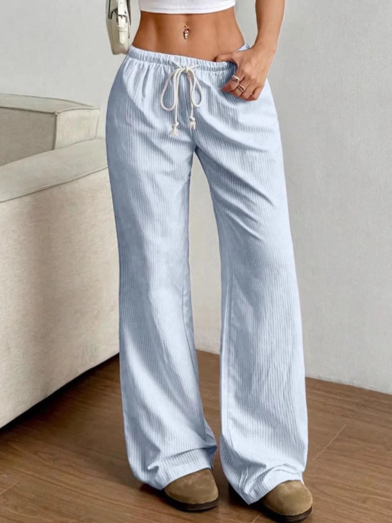 Light blue striped wide-leg pants with elastic waist and adjustable drawstring