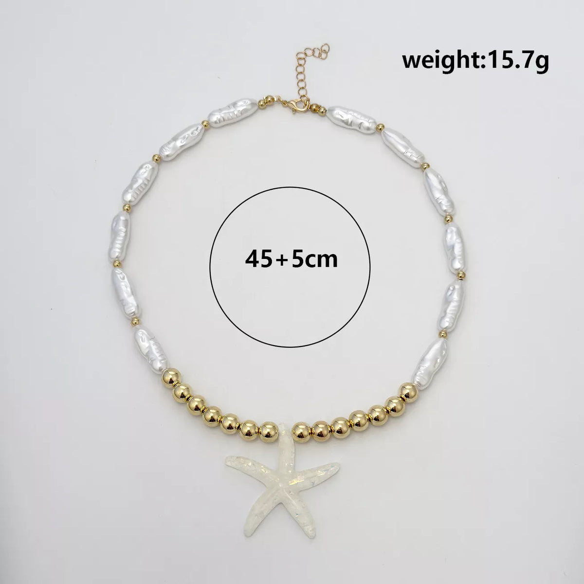 Starfish pendant necklace with length 45+5cm and weight 15.7g, pearl-look and gold beads