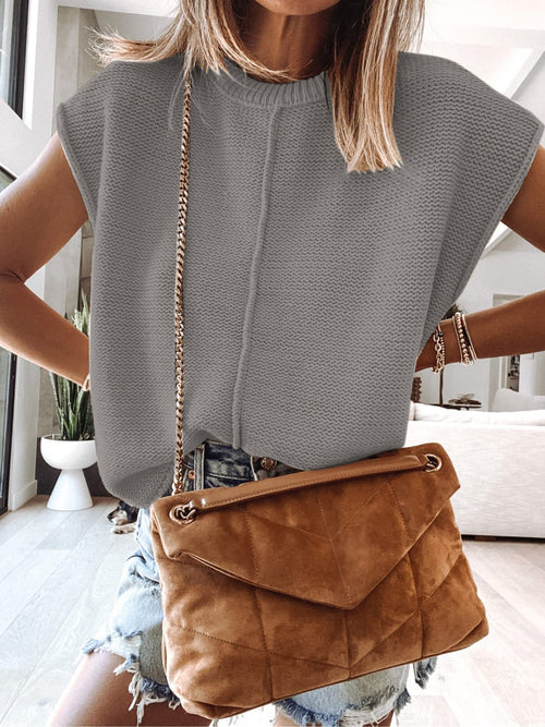 Cap-sleeve sweater vest in dark gray knit with a ribbed crew neckline and textured body