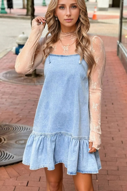 Light blue denim spaghetti strap dress with bow detail and ruffle hem, front view