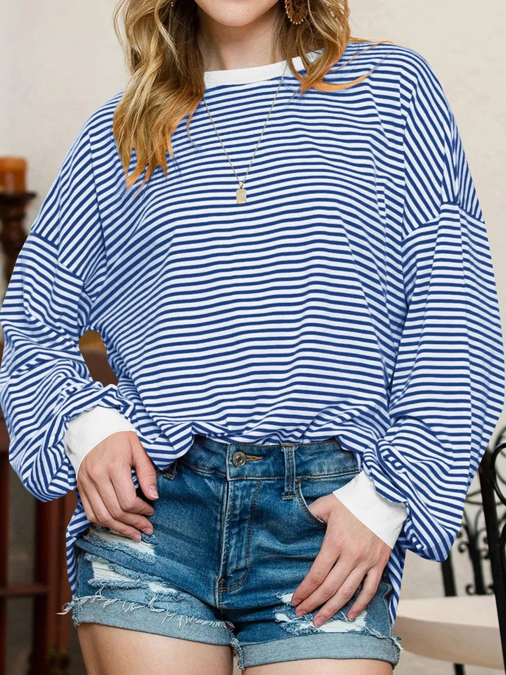 Contrast striped long sleeve sweatshirt in blue and white, loose fit with ribbed neckline