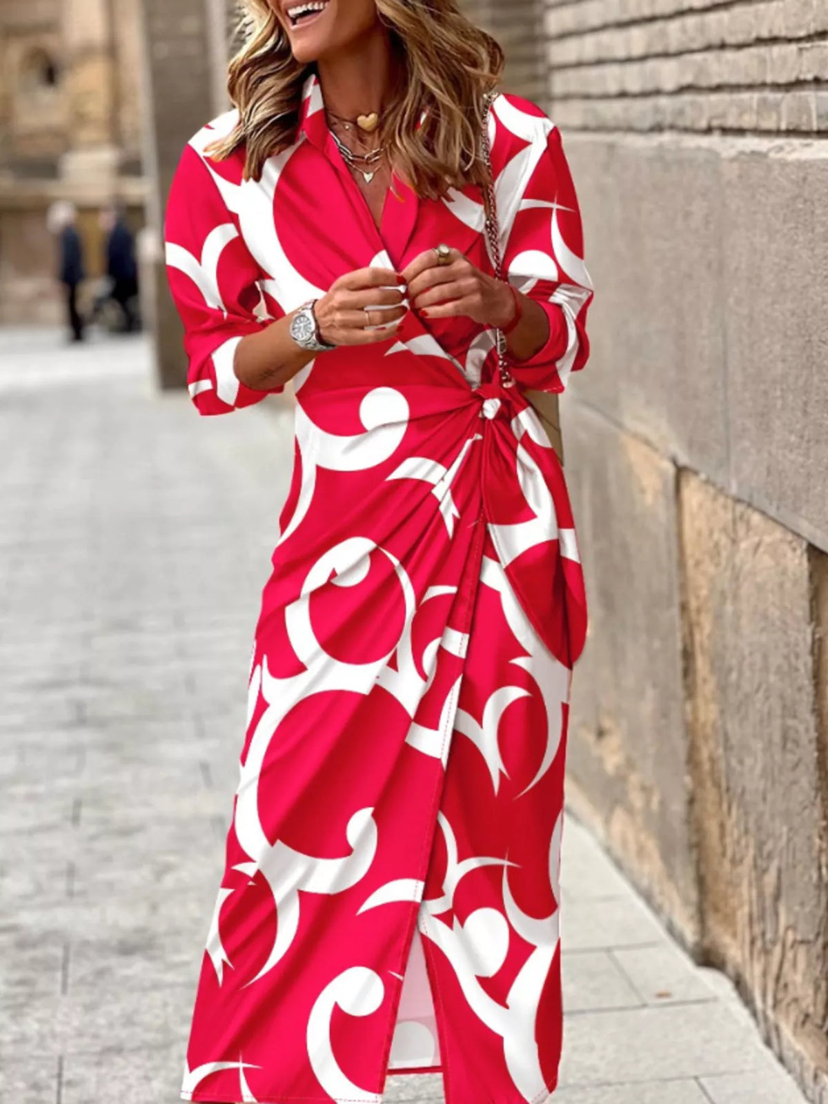 Red wrap midi dress with white abstract print, V-neck and tied waist belt