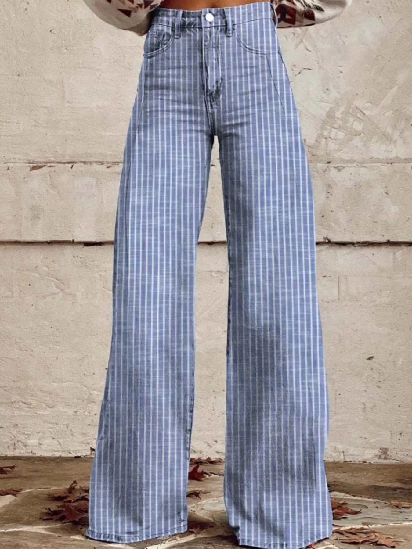Light blue striped high-waisted wide-leg jeans with button fly and belt loops