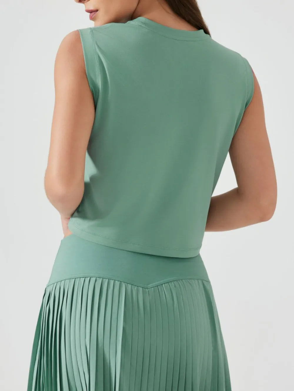 Millennia cropped active tank, sleeveless with round neck, teal green (back view).