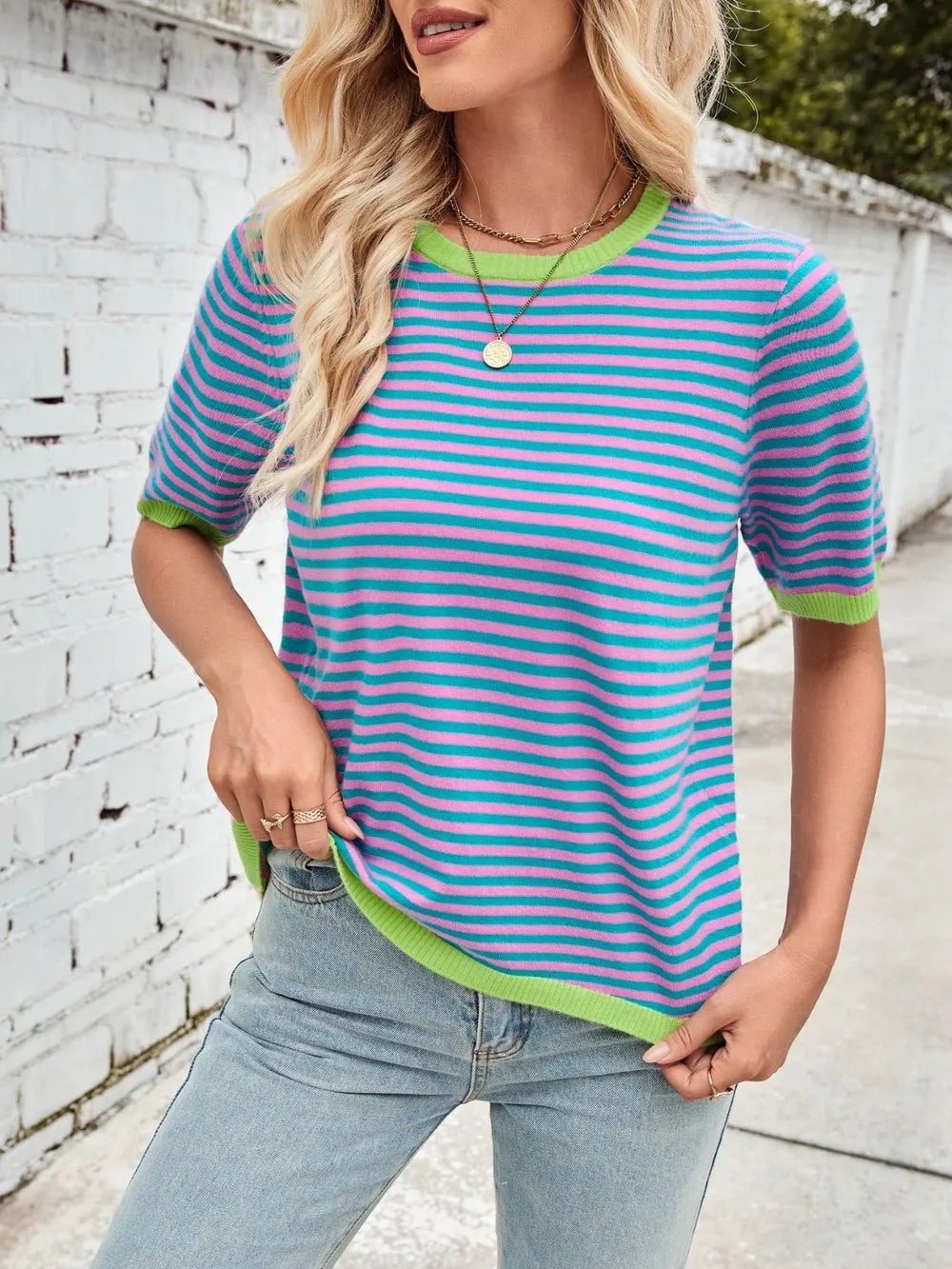 Turquoise and pink striped knit top with lime green round neck and half sleeves