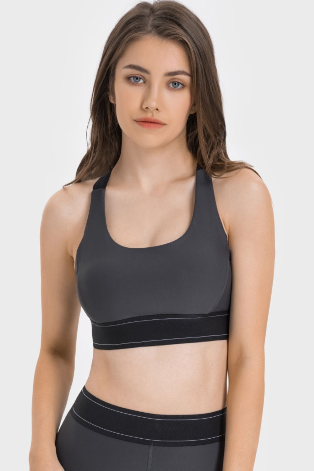 Contrast sports bra front view with black contrast band and scoop neckline
