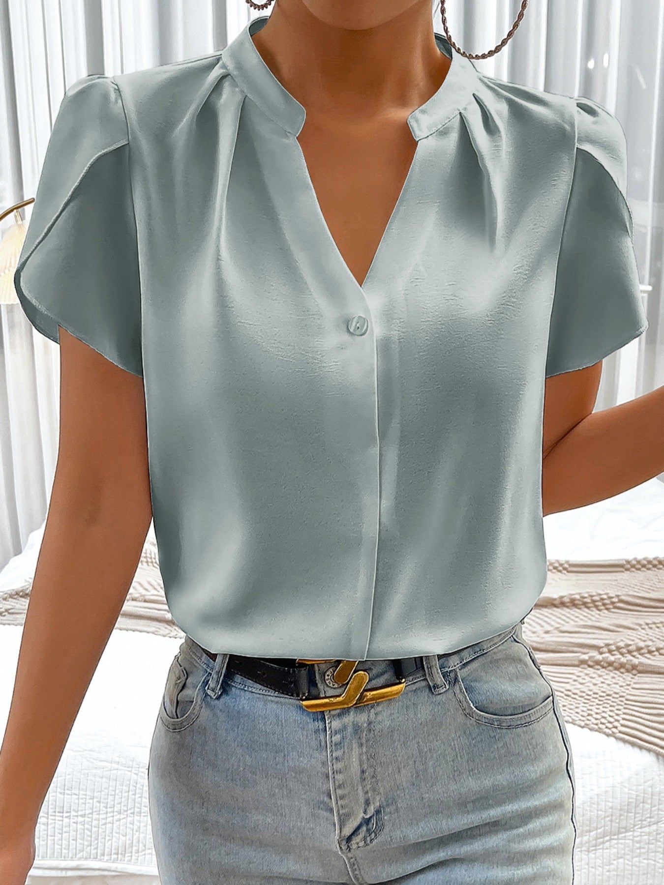 Notched Neckline Petal Sleeve Blouse by Trendsi in pale blue satin-like fabric.