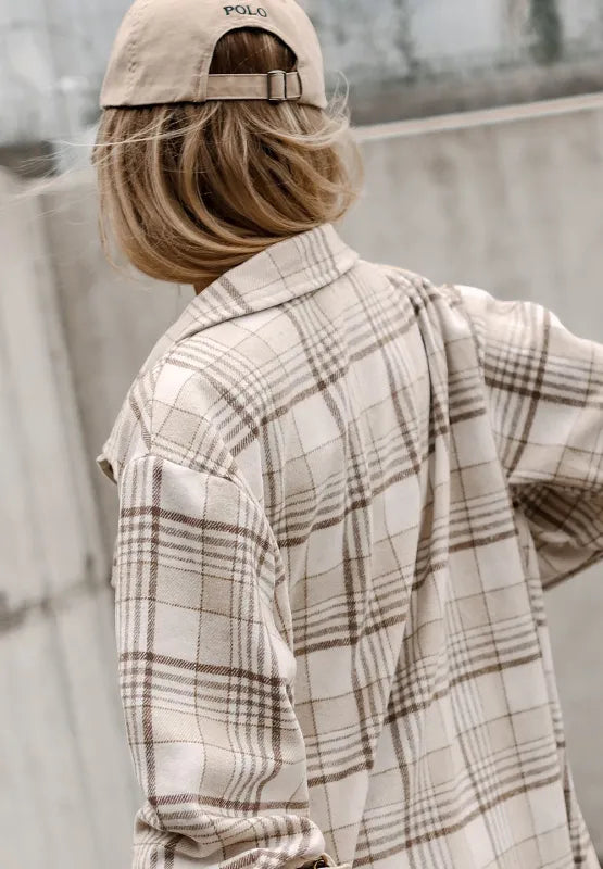 Plaid shacket back view with removable hood and full-length sleeves
