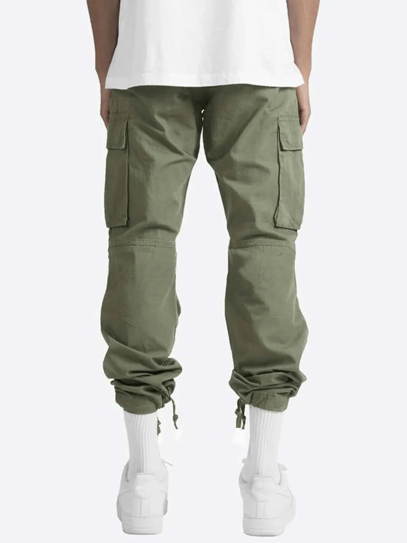 Green cargo pants with drawstring waist, flap pockets, and elastic cuffs