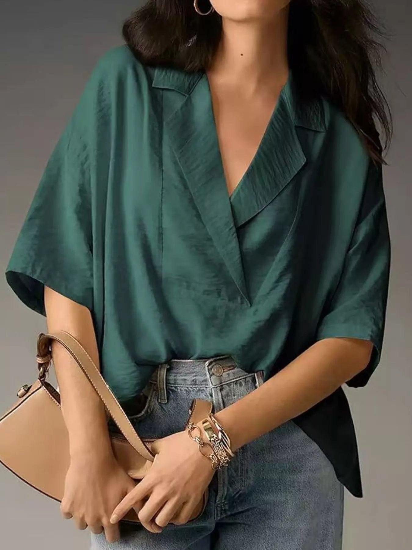 Dark green relaxed-fit half-sleeve blouse with V-neck and wide collar, loose drape