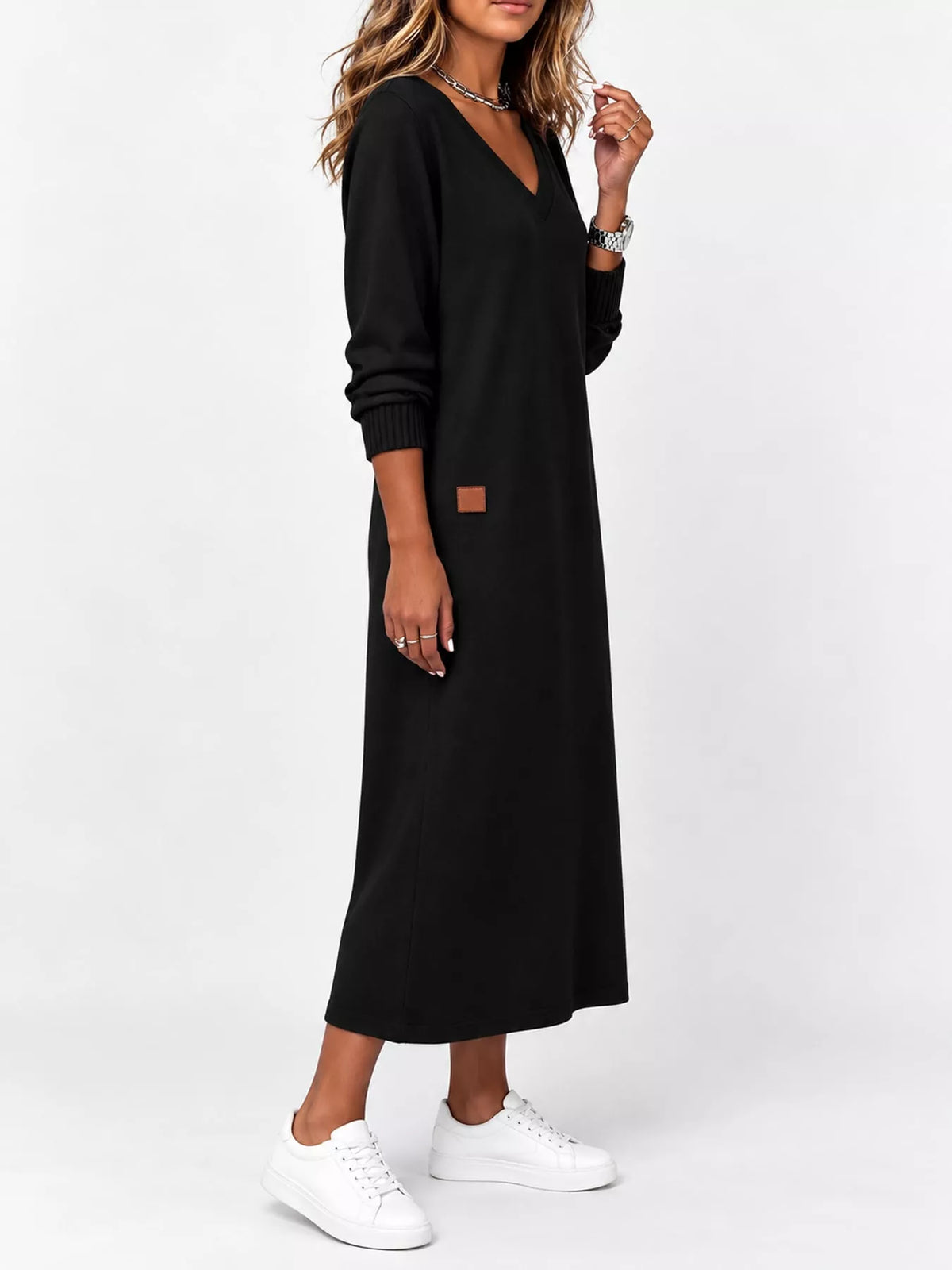 V-neck long-sleeve midi dress in black, front view with cuffed sleeves and patch detail