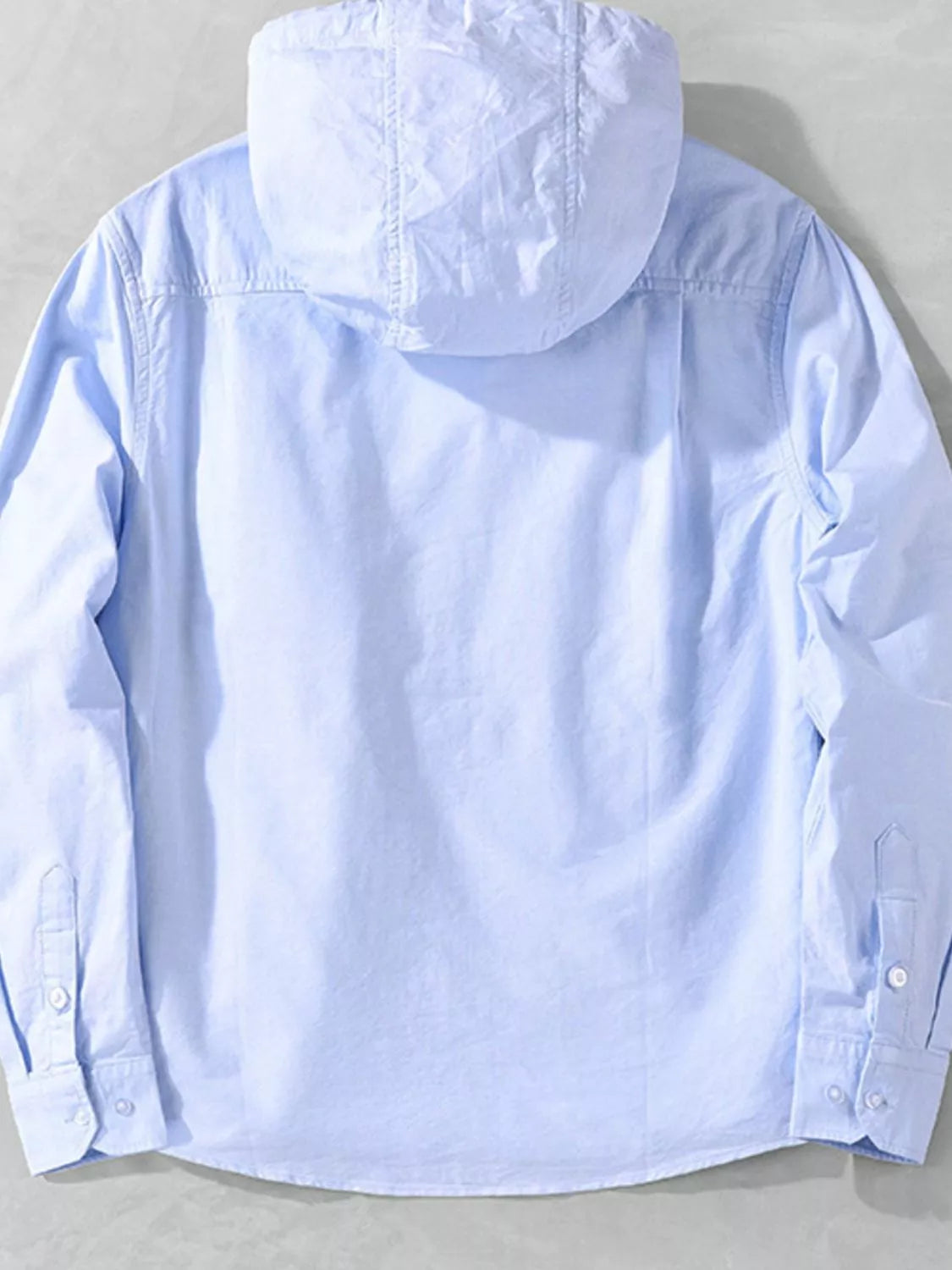 Light blue hooded shacket with button cuffs and chest pocket