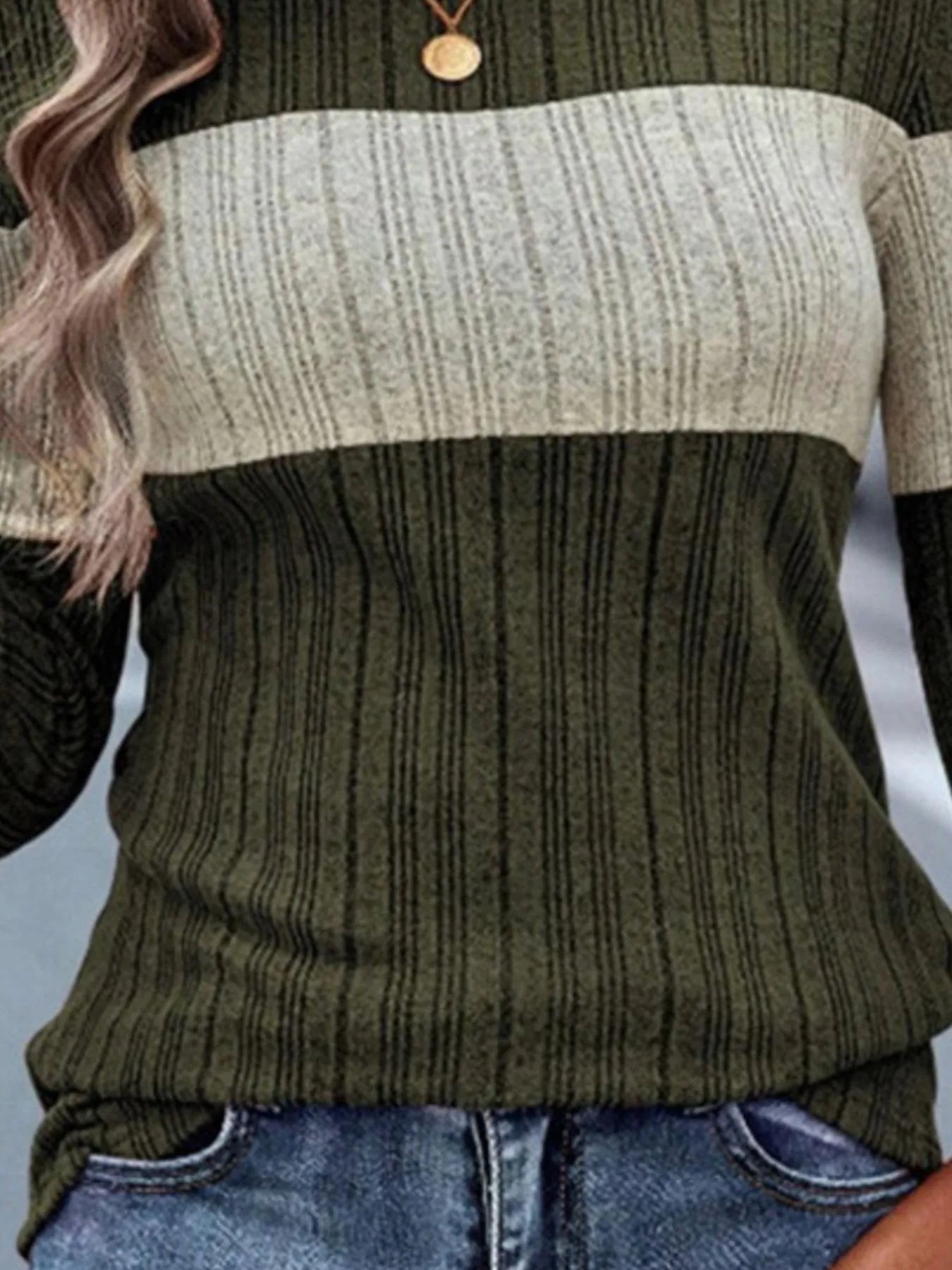 Color-block round-neck long-sleeve sweater with dark green and cream horizontal bands.