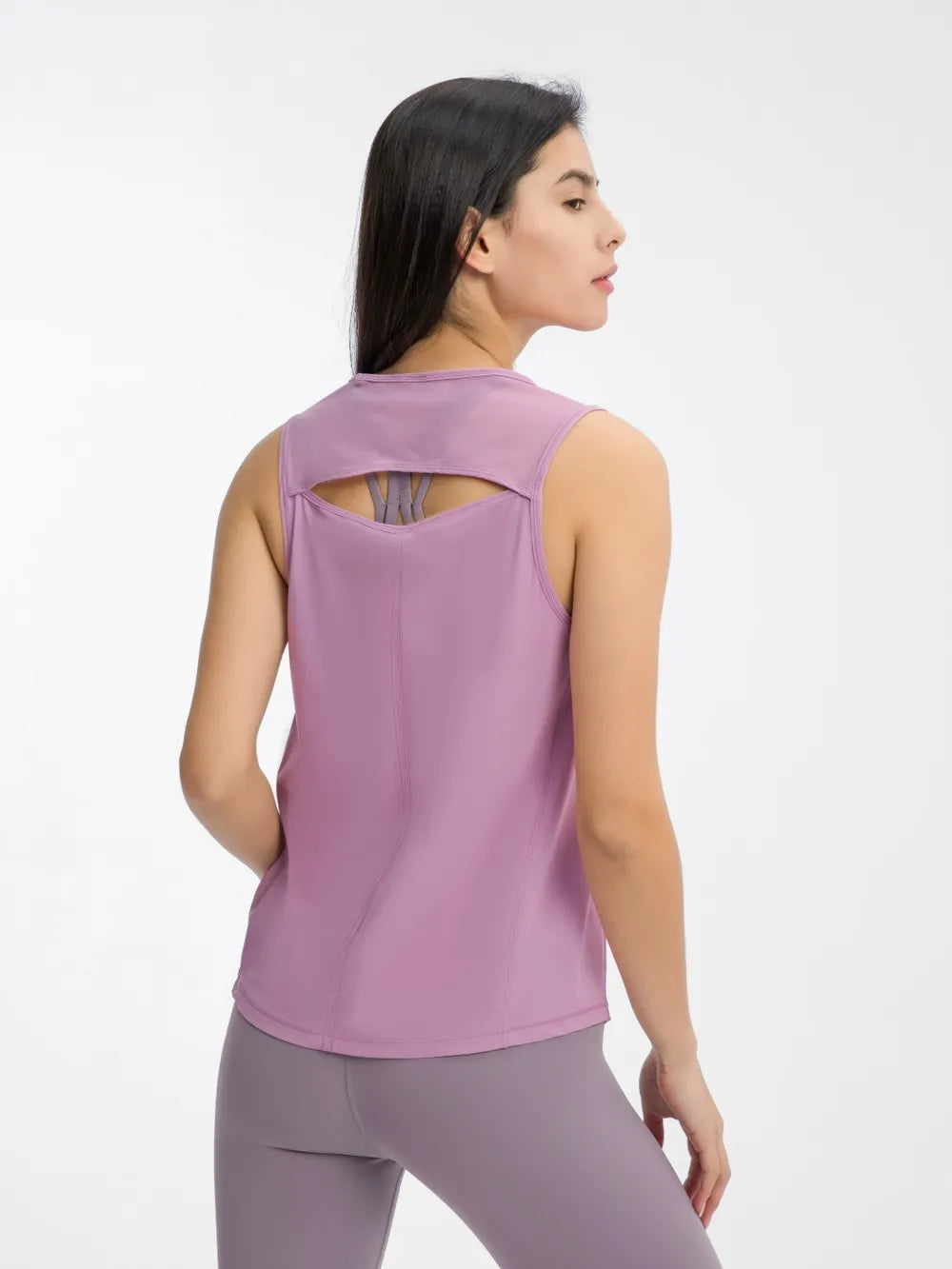 Purple active tank top with cutout back and crisscross strap detail