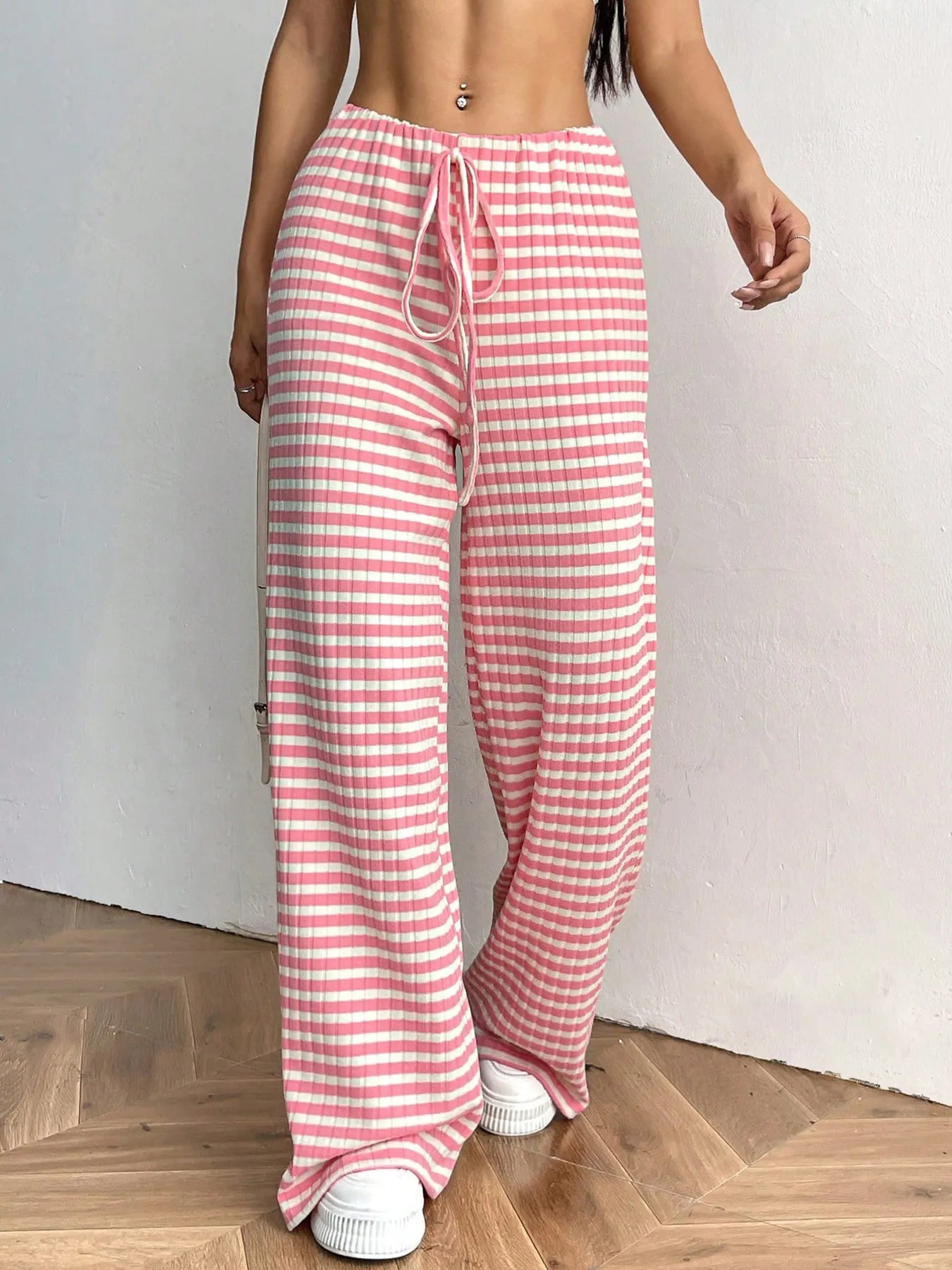 Striped wide-leg drawstring pants, pink-and-white striped fabric, drawstring at waist