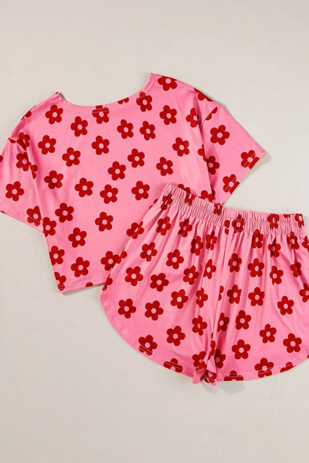 Coral floral cropped tee and shorts set, flat lay with elastic waist