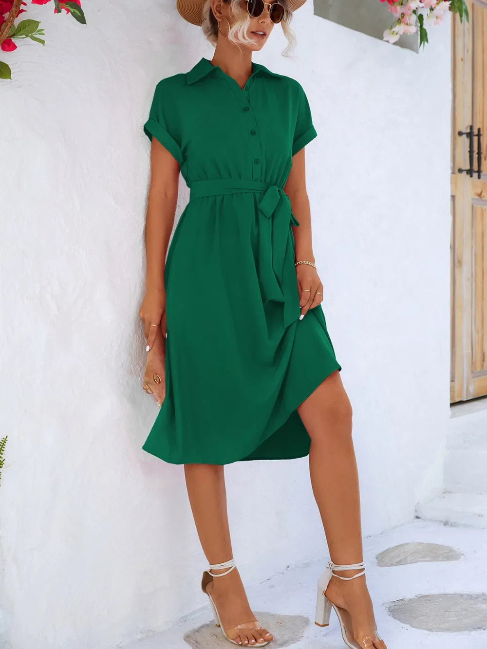 Green short sleeve tie-waist button-front dress, front view with tied belt at waist