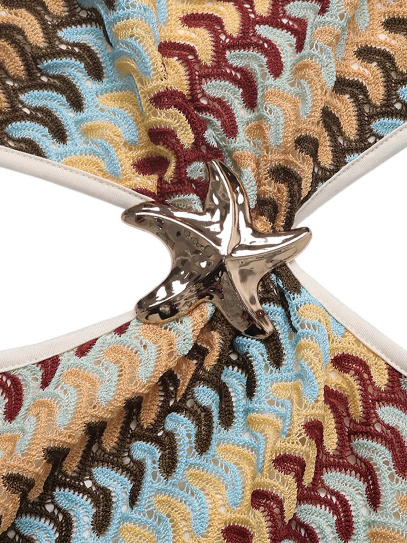Single Shoulder Cutout Mini Dress; multicolor crocheted lace in blue, beige, brown, maroon with metallic star buckle.
