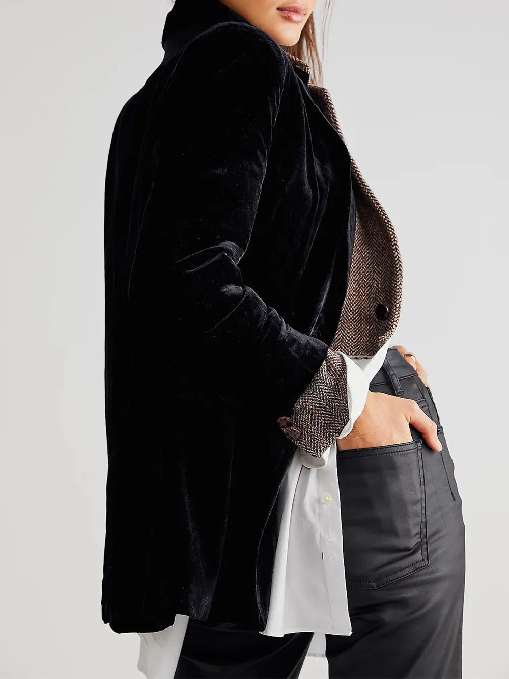 Black corduroy blazer sleeve and side view with single-breasted buttons and pocket