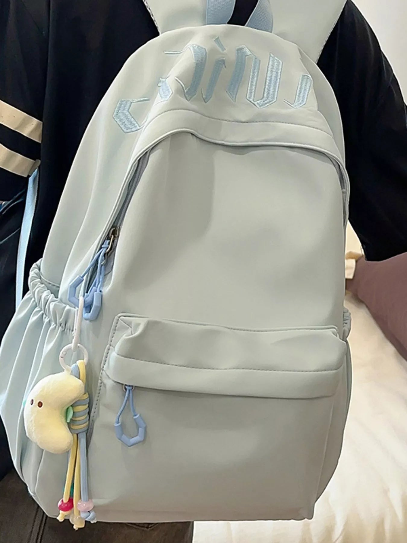 Cedar & Moore Embroidered Letter Backpack, light blue, medium size by Trendsi