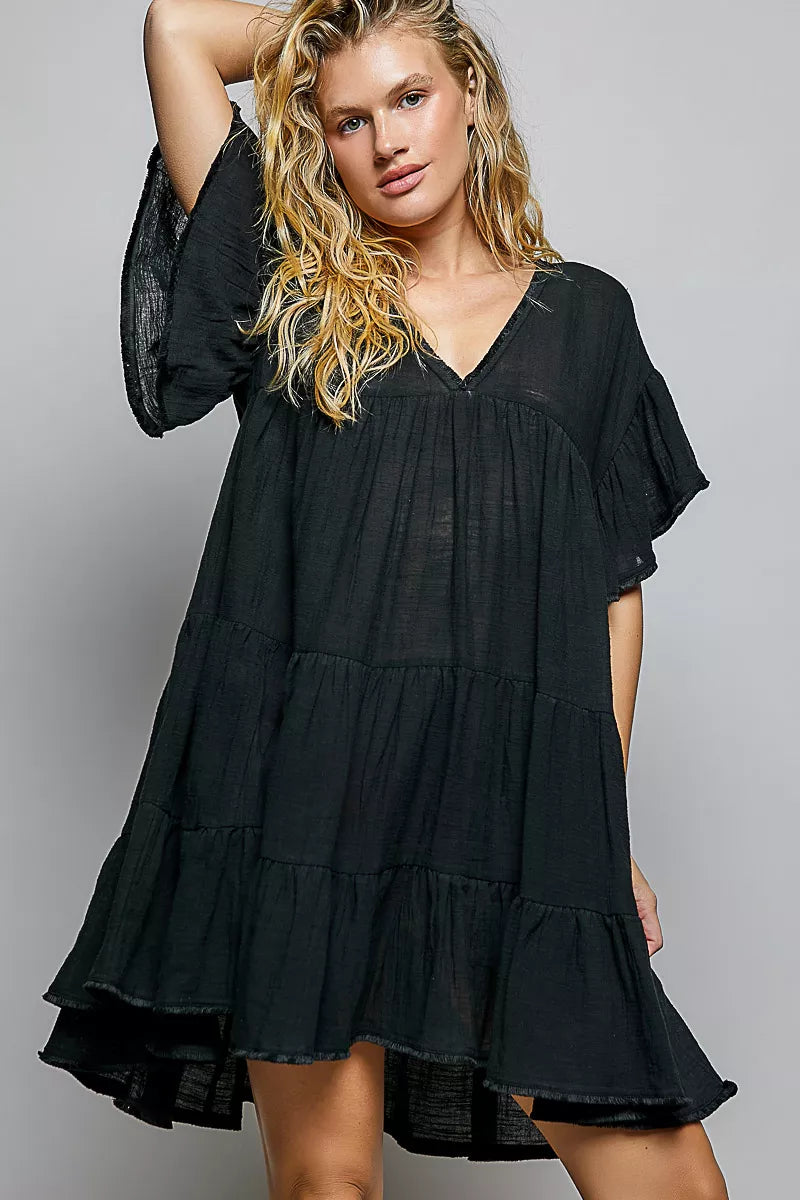 Black cotton ruffle shirred V-neck short-sleeve dress with tiered skirt
