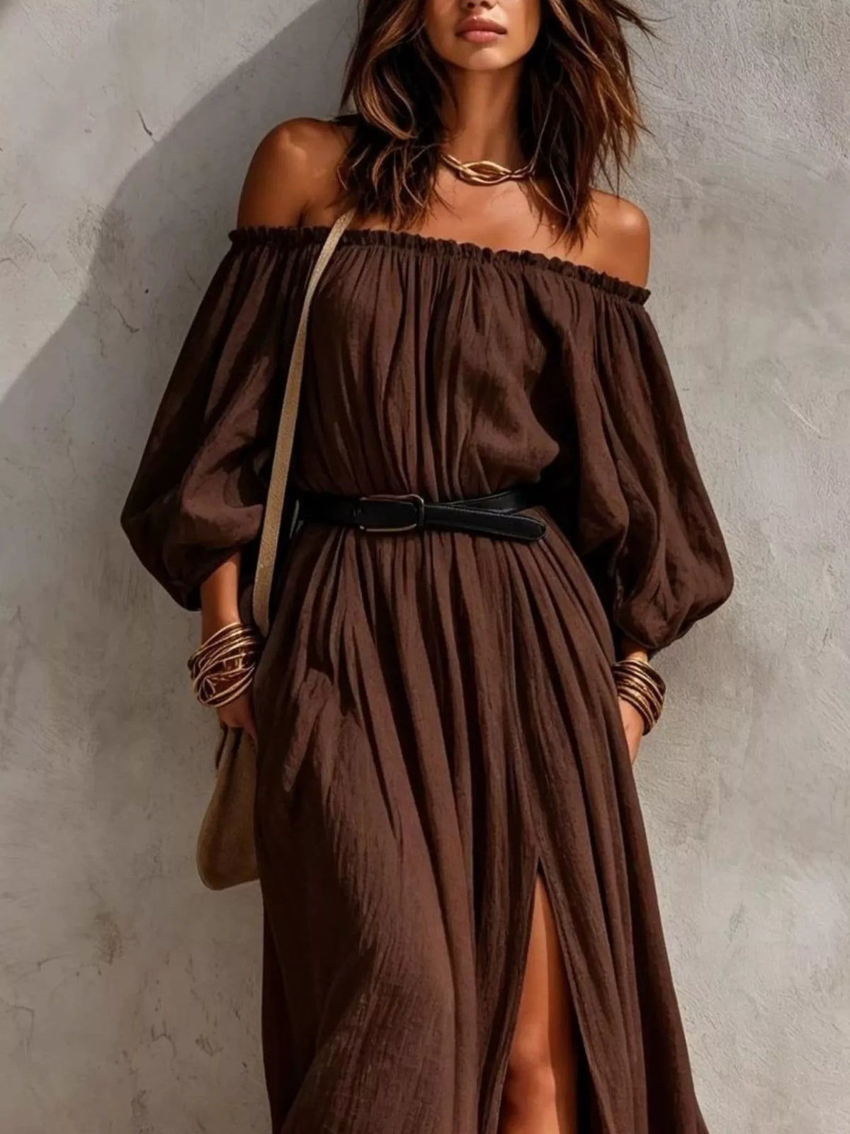 Dark brown off-shoulder maxi dress with belt, gathered bodice, flowing skirt, front slit