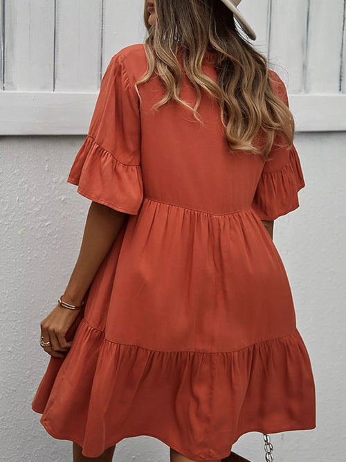 Terracotta tiered mini dress with short ruffle sleeves and button placket detail