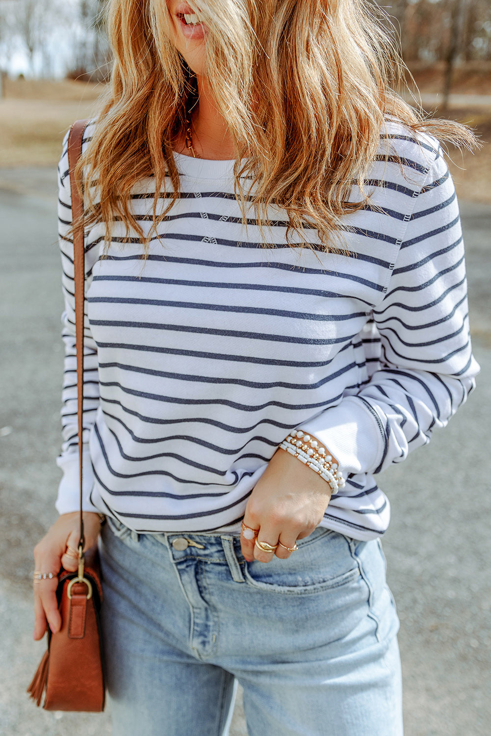 Striped long-sleeve round-neck top, navy and white horizontal stripes, relaxed fit