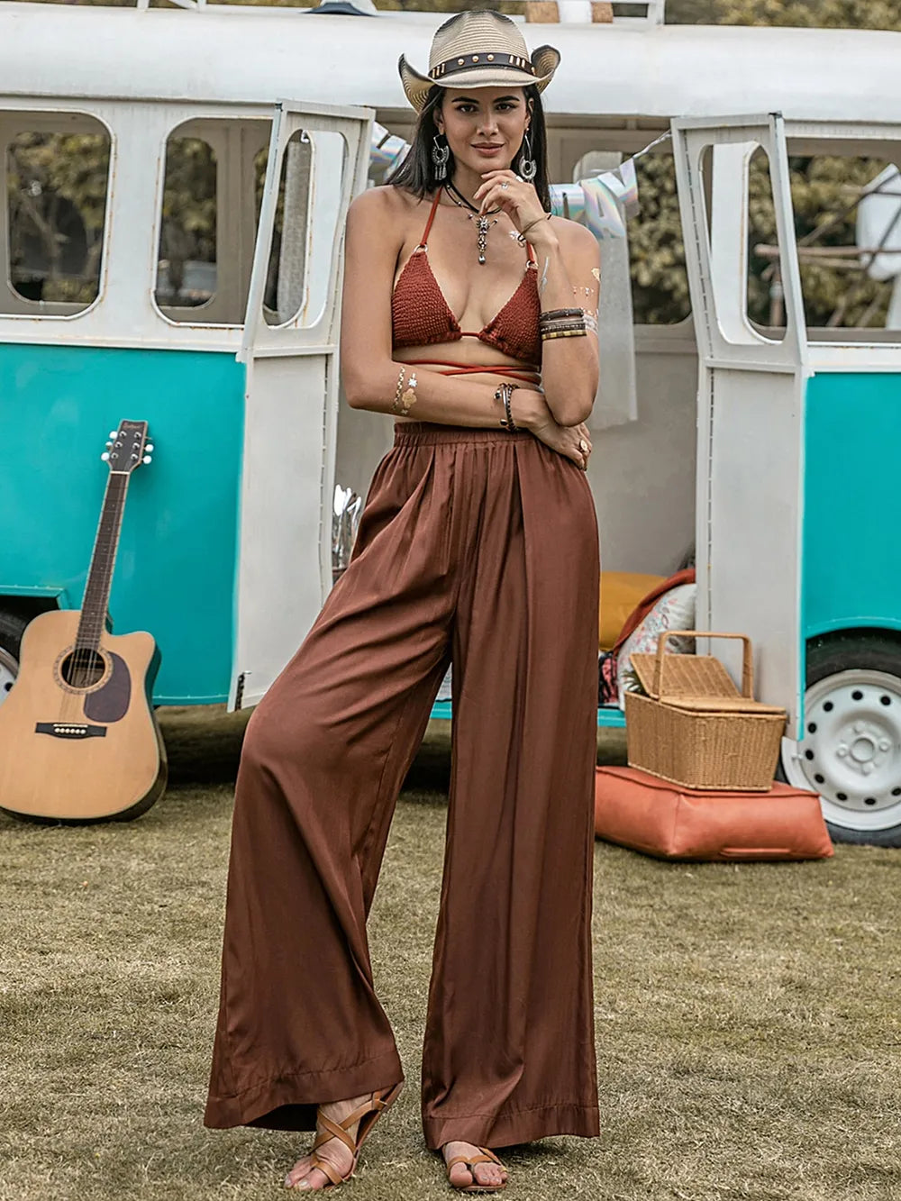 Brown high-waist wide-leg pants with gathered elastic waist and wide straight legs, front view
